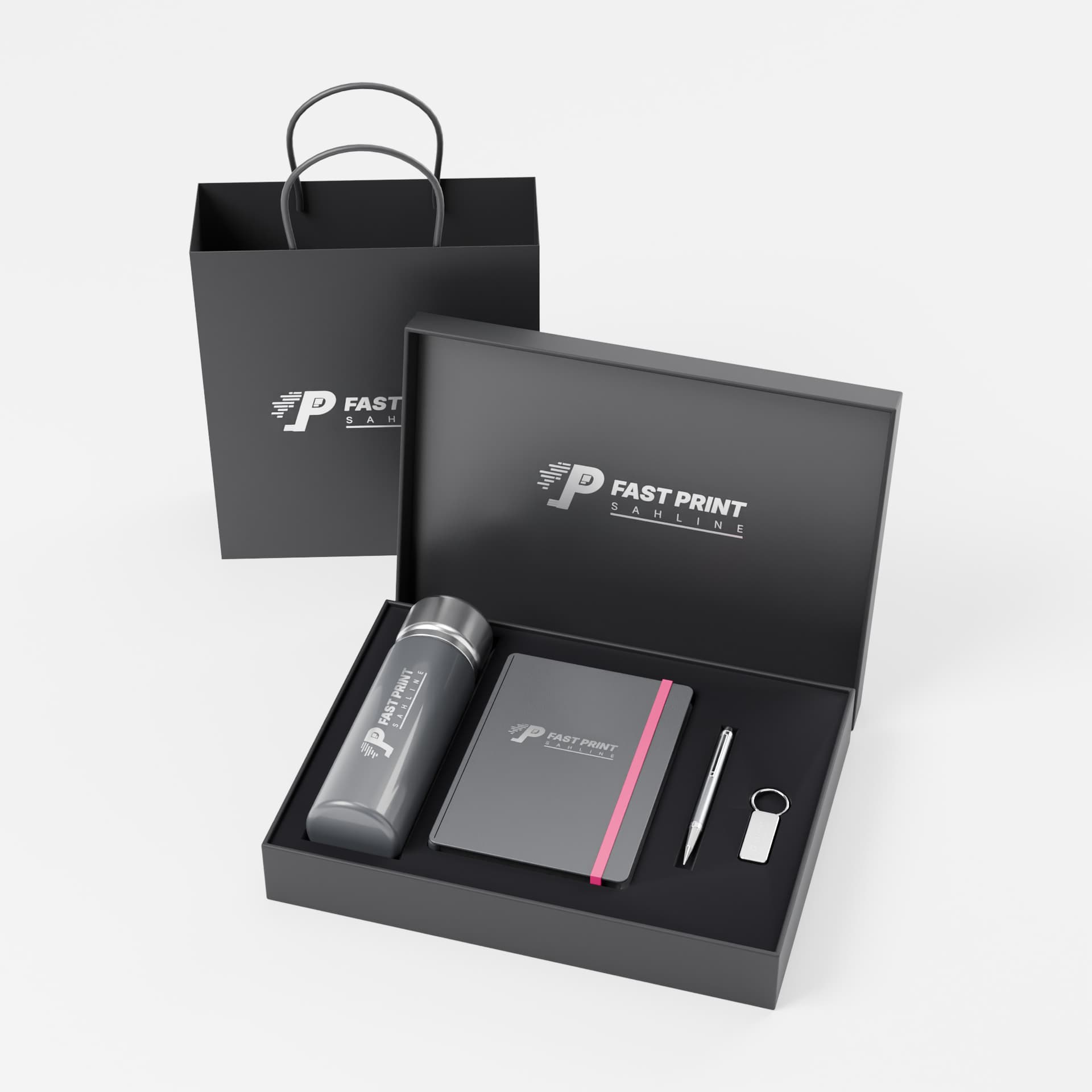 Coffret cadeau 4 pièces : gourde, carnet, stylo et porte-clés marqués au logo, avec son sac